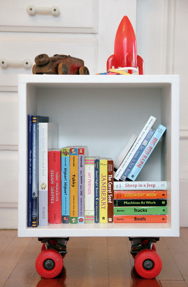 DIY Rolling Skateboard Book Cubby: The mother is a genius who used skateboard wheels to make a funny Rolling Book Cubby. I think it's great that this bookcase is not only a place for the little baby's growing book collection, but also serves as a wheelbarrow. 