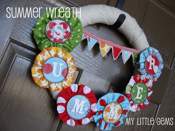Summer wreath made of burlap and fabric. This burlap and fabric wreath with letters from 