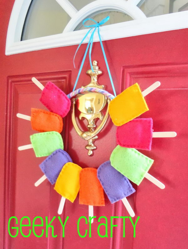 Summer popsicle wreath. Popsicles are the symbol of summer. It's so cool to use this idea to make such a summer wreath. 
