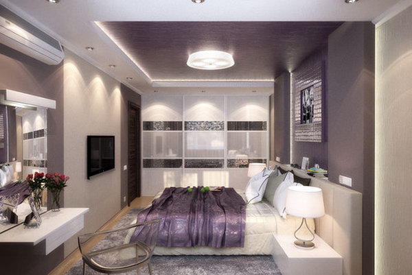 Trendy Silver and Lilac: It's a bold way to paint the back wall and ceiling in purple, as this sometimes gives your room a strong, dark look. But this bedroom looks bright and elegant, with a helping of white and cheering up silver. Love the idea of ​​different materials to scream the romance of the purple. 