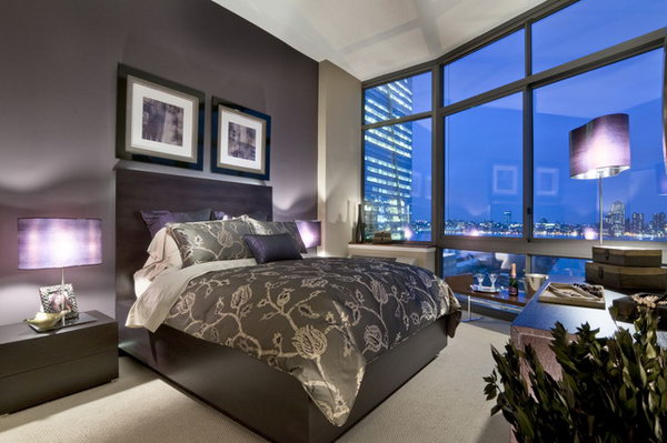     Deep Purple Hue: This deep warm purple hue looks fantastic, paired with dark wood tones and light, neutral tones. What made this bedroom stand out was the large window from wall to wall and from floor to ceiling. If you have windows like this, you can duplicate this glamorous bedroom.