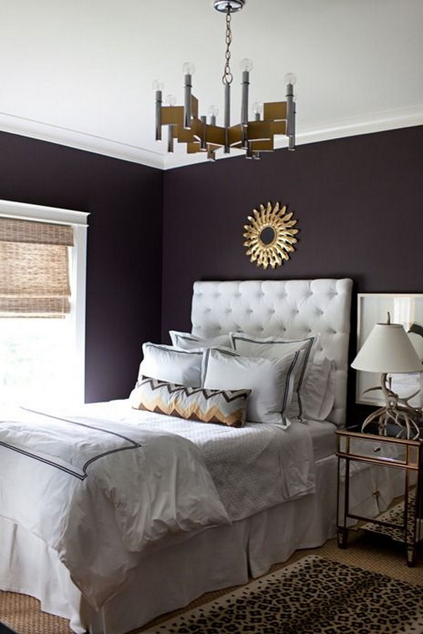     Deep purple wall: The deep color speaks volumes in this simple but elegantly designed room!