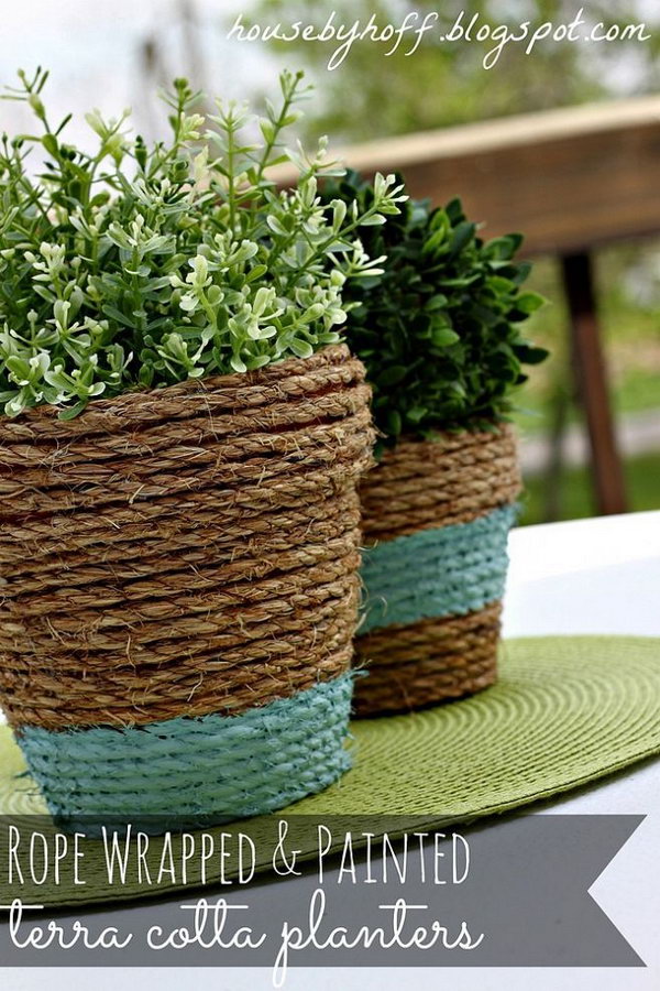 Flower pots wrapped in ropes. Wrap a rope around some cheap terracotta pots and add a hint of paint residue. The result is a sweet outdoor centerpiece! You can find detailed information in the tutorial 