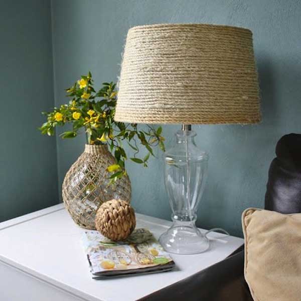 DIY rope wrapped lampshade. Turn a boring, simple lampshade into a custom shade with sisal rope. This is a simple but novel project.