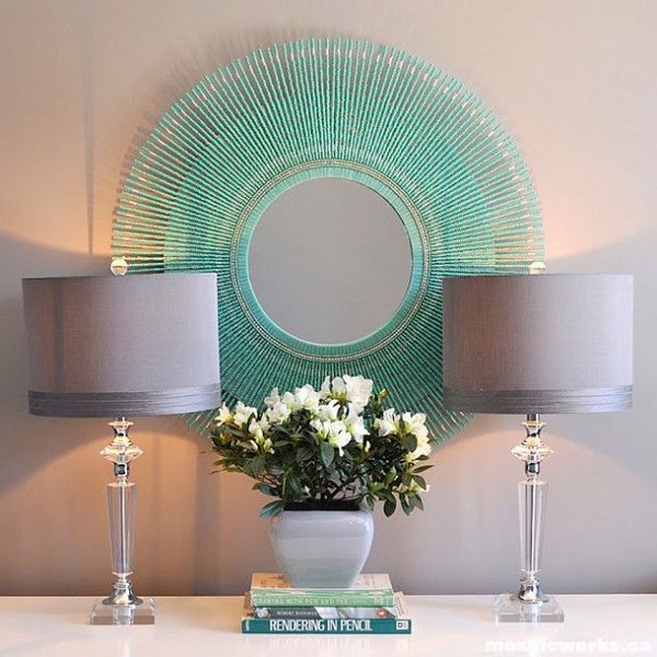     DIY aquamarine sunburst mirror. This is another idea about DIY mirrored wall art. You can create different ones with pearls in any color as you like. 