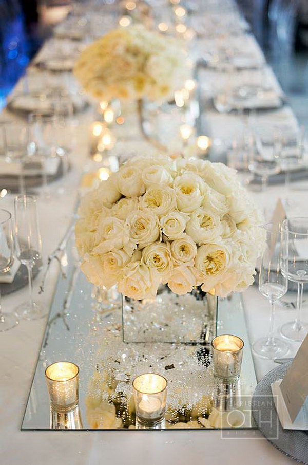     Mirror centerpieces decorations. The use of mirror elements at your wedding or any other party is so modern and unique. These wedding centerpieces with mirrors add elegance to the wedding. 