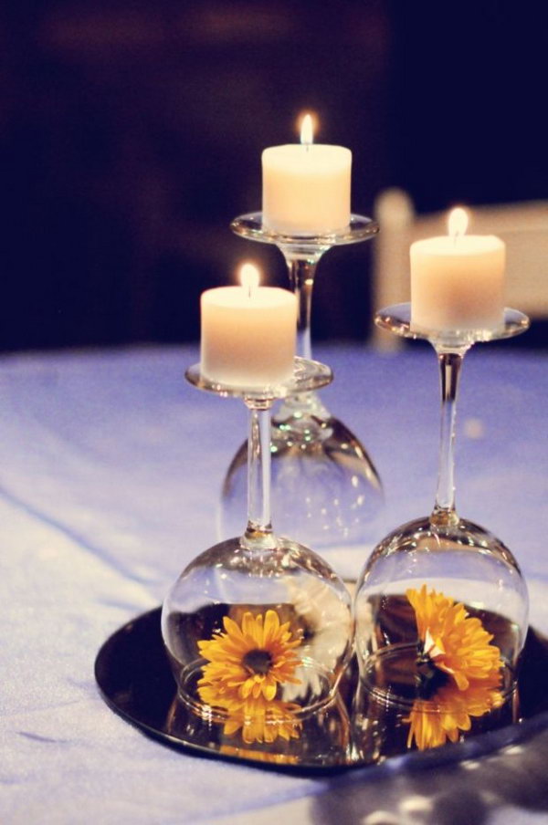     Mirror used as table decoration in the wedding. This table setting must be an impressive feature with a mix of candles, mirrors, wine glasses and colorful flowers on the wedding table. 