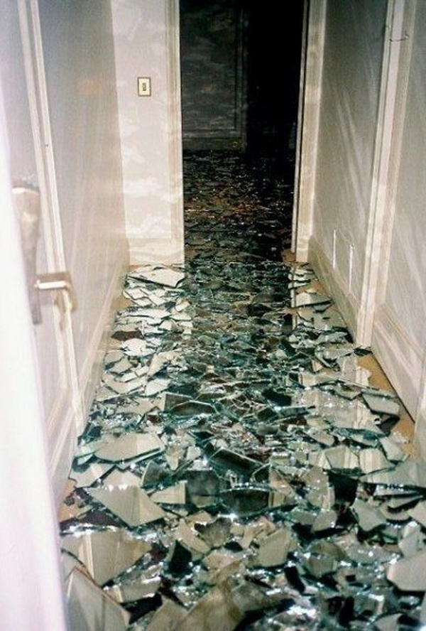 Cool bathroom floor with broken mirror. 