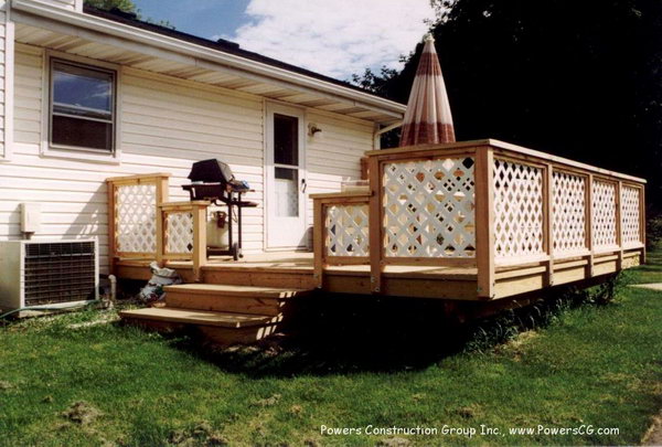     Lattice deck in white and wood. Safety is the top priority for everyone when designing the deck railing. And adding a rail to the deck can add security, privacy, and provide the most attractive cover through grids. This railing with wooden posts and white lattice baluster gives the room a rustic and exquisite look. 