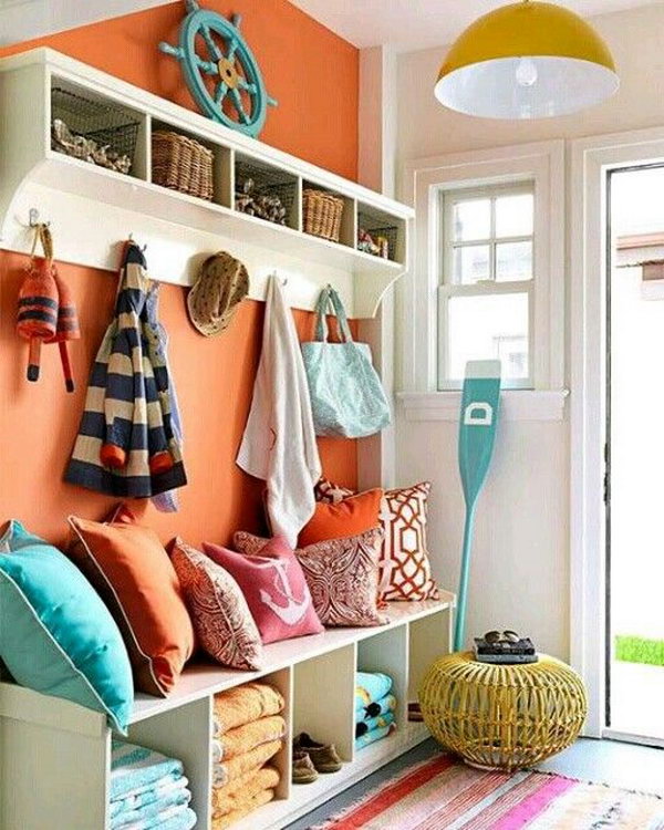     Fantastic colorful mud room. Love the bright color palette, orange, yellow, green, white. Simply beautiful details through! Great for the kids.