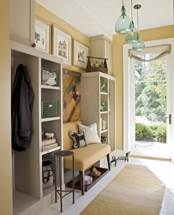     Neutral color mudroom. This yellow mud room is too pretty to be a "mud room". The layout of the colors is perfect and gives the room a warm and cozy look. 