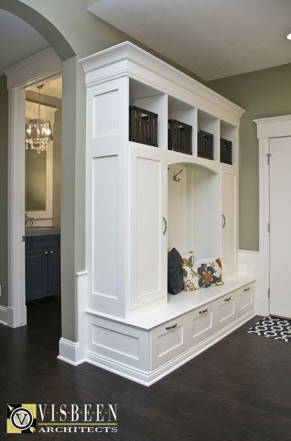     I love this mudroom area! This mud room behind the front door with built-in fixtures where you can put your shoes and other things is really worth a visit. I also love the color palette.