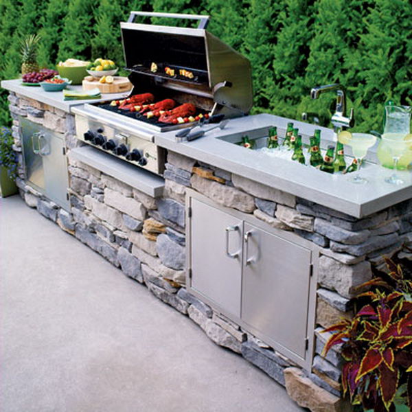 A stone kitchen can be both functional and pretty. It's really a great place for a summer party with a fantastic oven and a beer that doesn't cool well. 