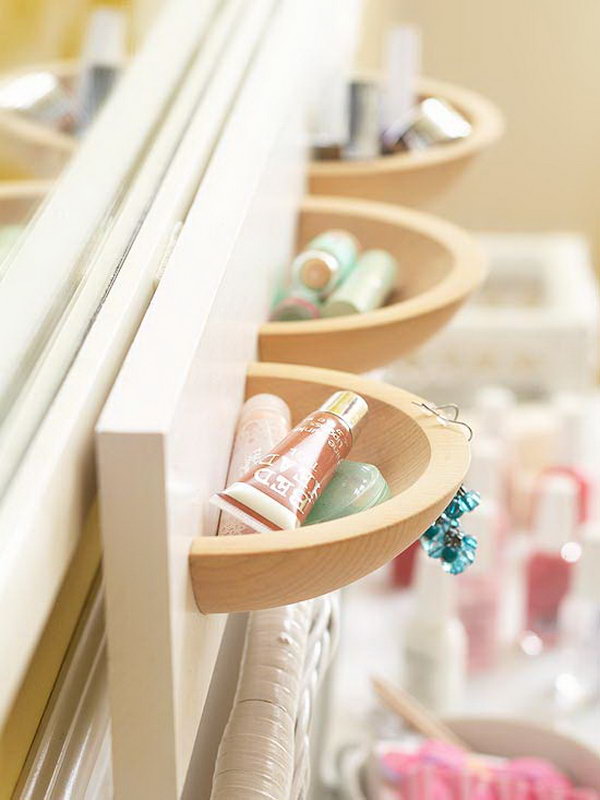 Use the wooden bowls you bought in a board cut in half and painted to use these cute and beautiful wall bags as a makeup storage. Of course, the size of the wall is up to you. 