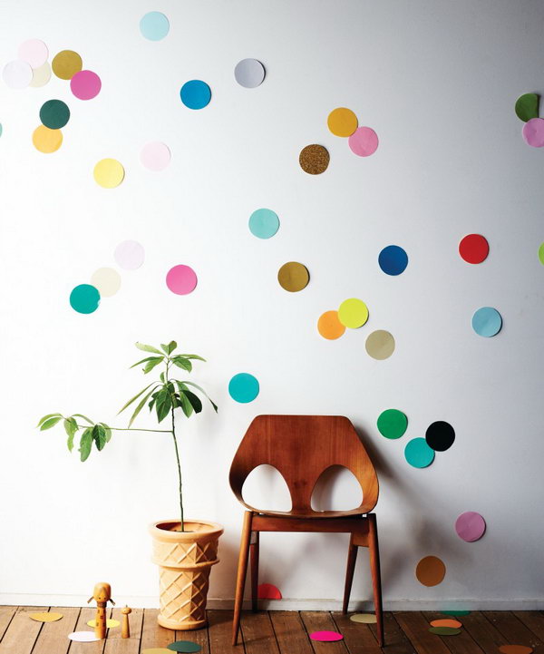 Huge confetti wall. Collect a stack of colored paper and cut out all the circles. Glue on the back and arrange all the circles as you wish to design the beautiful decor for the dormitory for girls in different colors.