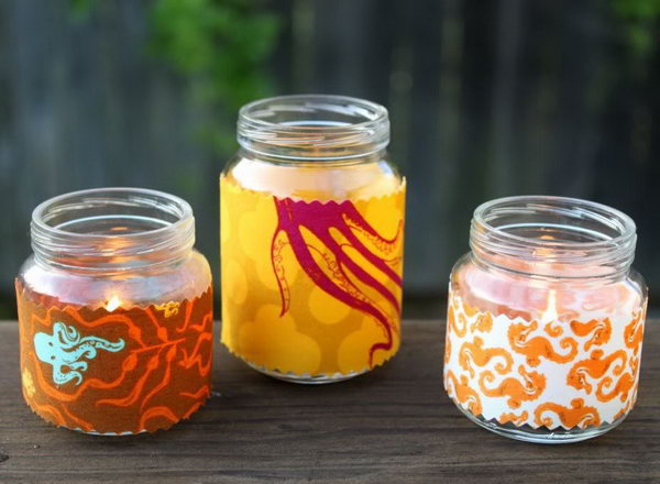 Baby Jar Votives fabric. Turn your simple glass into an exquisite one by wrapping the glass with a beautiful patterned fabric. Place candles to round off this adorable, sophisticated work of art.