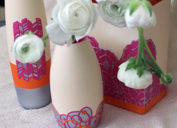 DIY textured clay vase. Use puffy paint to draw or trace your design, paint your vase and spray it with sealer. You get this beautiful structured, clay-like vase. Just show off your pretty spring blossoms to show off these flower sets.
