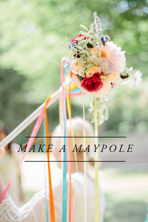 Maypole. Spray paint and some glue on the top of the metal circle, add flowers and colorful ribbons to create the wonderful artistic floral decor for May.