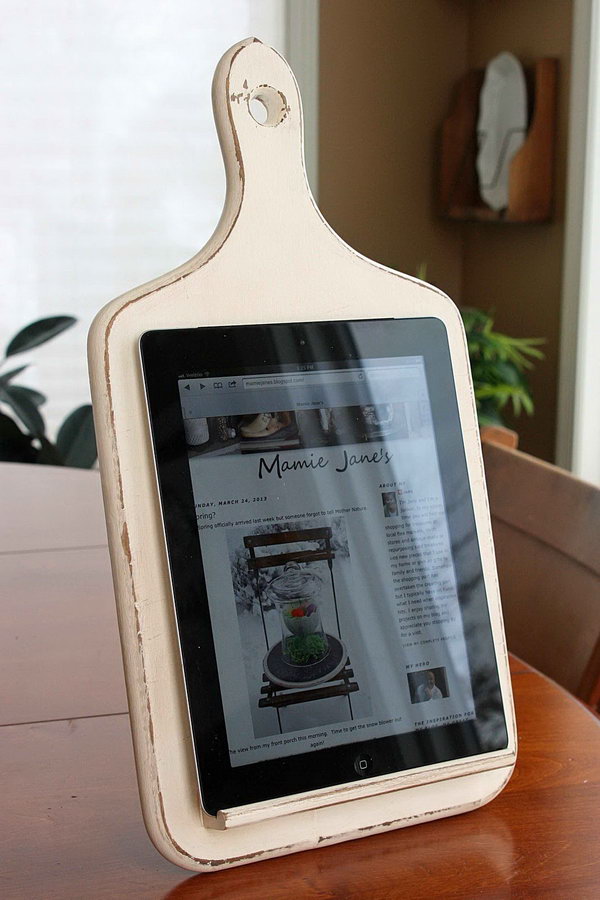 DIY kitchen iPad stand. This cool iPad holder consists of an old wooden kitchen board. It is convenient for you to follow recipes while cooking online.