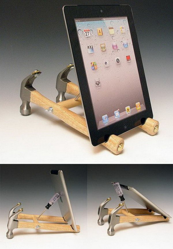 DIY hammer iPad stand. This is probably the most amazing, yet least practical iPad stand I've ever seen. It consists of a pair of hammers, a screwdriver and some old coins and bolts. 