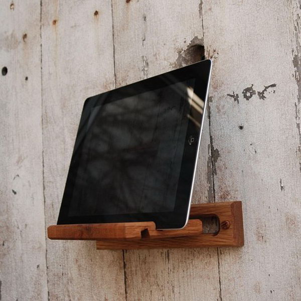 iPad easel. This iPad easel with its mounting compartment is the perfect accommodation for your iPad device in every room of your house. The design is simple, but the visual effect is fabulous.