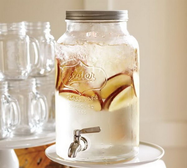 Mason jar beverage station. The collection, inspired by mason jars, continues the tradition of casual entertainment. It is fantastic that guests treat themselves to lemonade or iced tea with this mammoth mason jar beverage dispenser.
