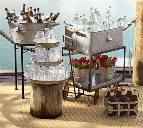 Mix and match drink station. Create this mix-and-match beverage station with galvanized step stands, tubs and a trolley. Serve them with wine bottles, mason jars.