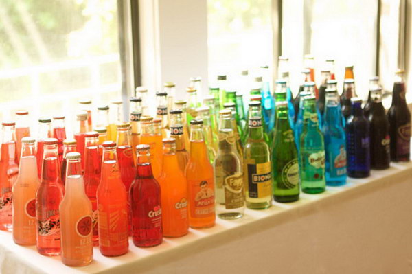 Classy Soda Bottle Drink Station. I really like this nice and fun layout with a selection of soda bottles in bright colors. It is perfect to serve it to satisfy the taste of all ages.