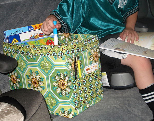If you have children of all ages in the car while traveling, it is a must to make such a bag. You can use children's toys, crayons, comics, LEGOs, or anything else that your kids may have on the trip so they don't get lost under the seat. 