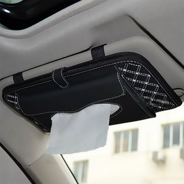 It is a good idea to attach a fabric bag to the Auto-Vision to keep CD, DVD and tissue paper within reach and to limit the storage space of your car. 