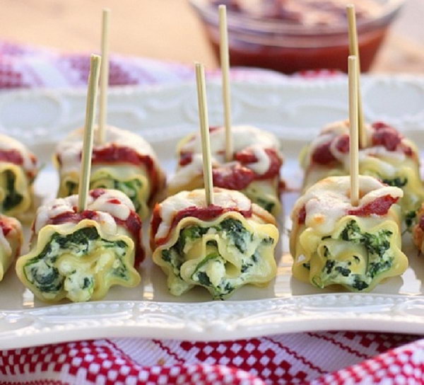 Mini spinach lasagna roll-ups. Prepare this classic comfort meal to turn your normal reception into a fun appetizer or party meal. Cut the spinach lasagna roll-ups into pieces and stick them through with toothpicks.