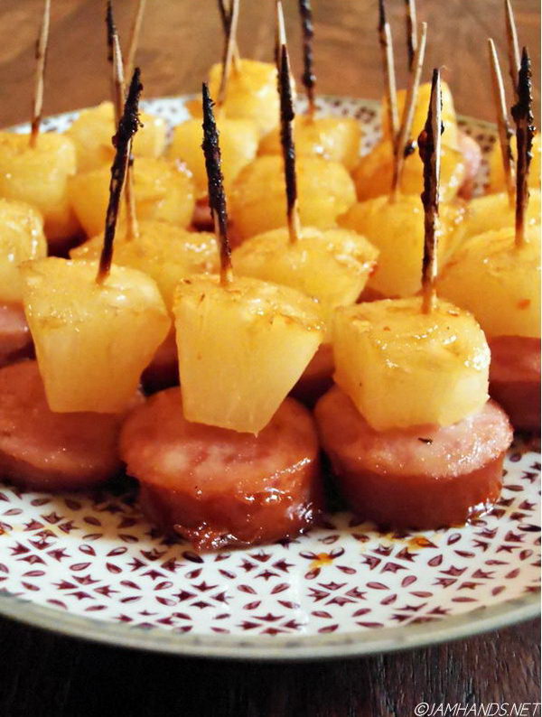 Glazed pineapple Kielbasa Bites. Pierce top Kielbasa slices with pineapple pieces and a toothpick. Place pieces of Kielbasa on the baking sheet and add some ingredients to serve your guests an incredibly delicious taste for a summer party. 