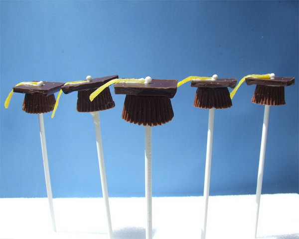 Graduation dessert idea. Highlight your own party with the rest with these adorable candy graduation caps. Place the Reece cups on wax paper and insert the lollipop sticks into the cup. Cover the cup with square chocolate, sticky bonbons and a rainbow chip.