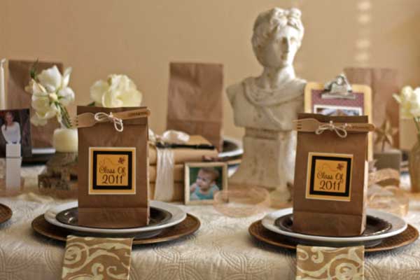 Graduation over the years. Use a natural burlap ribbon wrapped around vases and a scientific-looking bust to decorate the centerpiece. I really like the neutral color scheme to give the party a casual and school-like character.