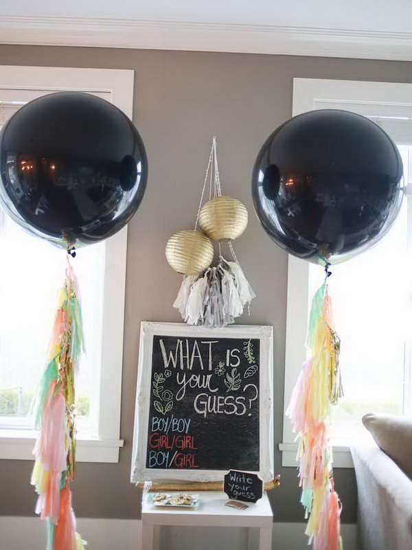 Boho inspired gender reveal party. Plan this incredible gender reveal party with fabulous black balloons with tassel garland streamers, beautiful flower crowns, a boho-inspired dessert table setting, star- and heart-shaped sugar cookies, and blackboard signs. Every detail is just so fantastic.