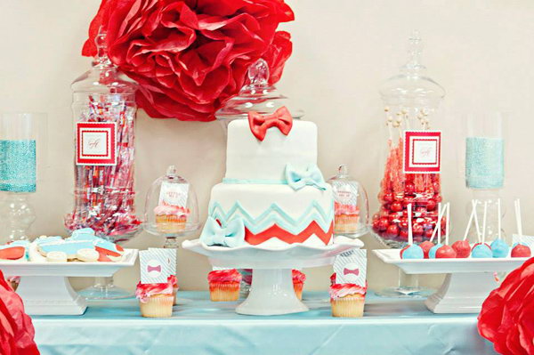 Fly Gender Reveal Party. This adorable fly-inspired gender revelation party is perfect for the little guy on the way to meet his parents with a good combination of a welcome sign with big reading and polka dot flies, giant pharmacist jars, adorable cookies, floral centerpieces. Fly invitations.