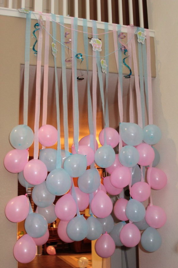 Gender reveal party decorations. A good background is necessary to set the tone for this exciting party full of surprises. Design the pink and blue balloon cascade to illuminate your party for the big celebration.