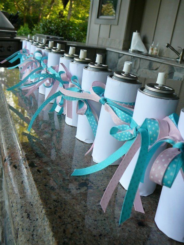 Stupid String Gender Reveal Party. Wrap blue or pink cans in white paper and decorate them with a pink and blue ribbon. Spray the strings to make the exciting discovery.