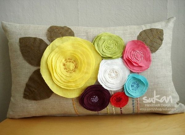 This DIY flower pillow gives your living room a spring-like touch. 