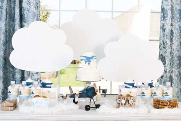 Vintage airplane themed birthday parties are popular for boys. This party is based on a blue and white color scheme, which gives the party a very clean and friendly look.