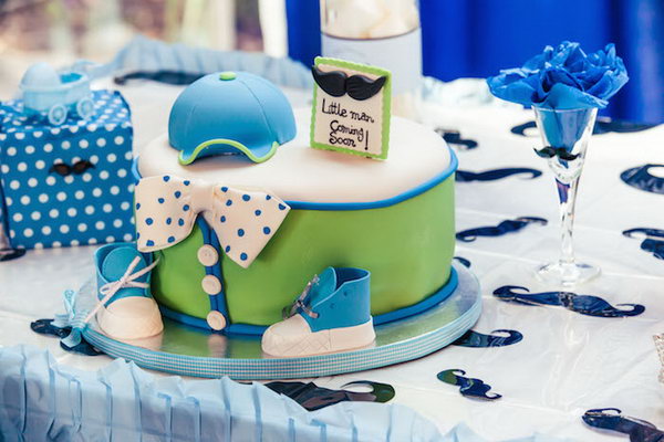 How cute is this little man mustache themed party! Check out the cute Little Man cake, all the fabulous mustache banners and decorations, the cute mustache tablecloth combined with a ruffled blue tablecloth, the cute favor bags with mustaches and much more!