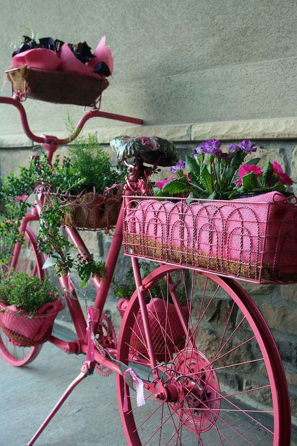 Nowadays only a few people use the bicycles as a vehicle and the old or broken bicycles also take up space in your house. Then how to deal with it. Here's a great way to reuse the old bikes to plant flowers and grass and decorate your garden.