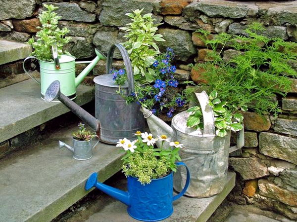 The old watering can could be turned into some flower pots.