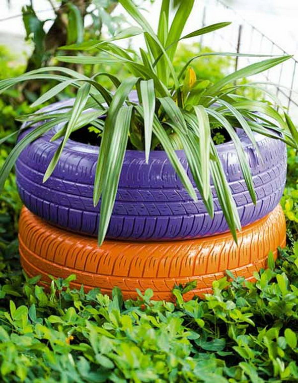 Have the used car tires colored and decorated with plants and flowers. It will be a beautiful landscape in your garden.
