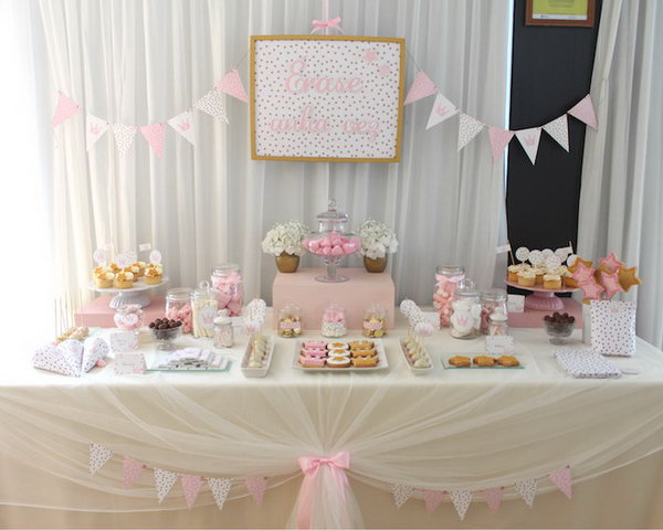 Once upon a time there was a princess party. This adorable princess party combines sweet star and crown sugar cookies, pennant banners, golden crowns made of pipe cleaners, transparent tablecloth with pink bow tie to spice up every detail.