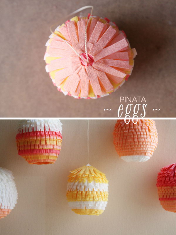 Cute Easter pinata eggs. DIY this pi? Ata Easter eggs with blown out jumbo chicken eggs, floral crepe paper, thread, glue and toothpicks. They are easy to make and will definitely brighten up your celebration.