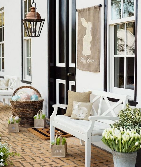 Easter porch decoration idea. I appreciate this decoration style with amazing grace. Show off some fresh plants and baskets of colorful Easter eggs. You can enjoy the good time in your armchair.