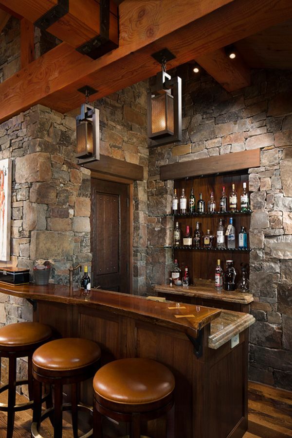 Rustic home bar design. The house bar has now become one of the typical rooms in houses. Rich wood, leather armchairs, stone walls are popular in modern life.