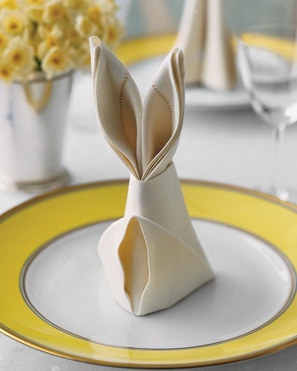 Bunny fold for napkins. These Easter rabbit-shaped napkins are an easy way to put napkins on your Easter table that require only a few simple folds. 