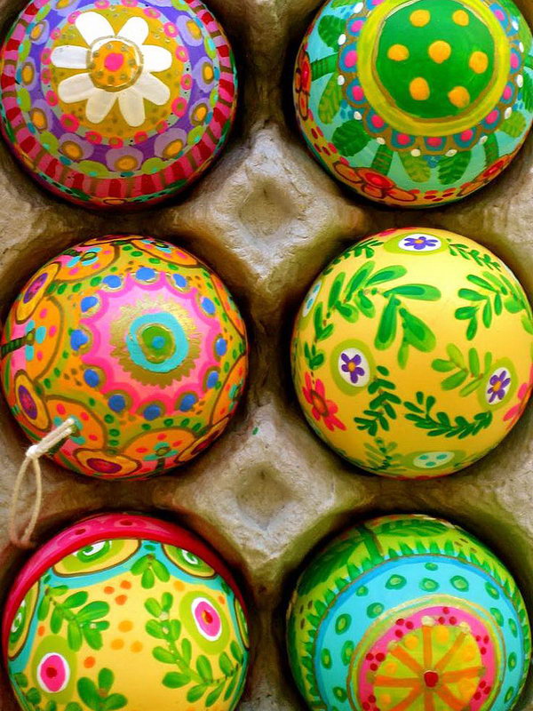Paint Easter eggs from the bottom up with spring patterns.